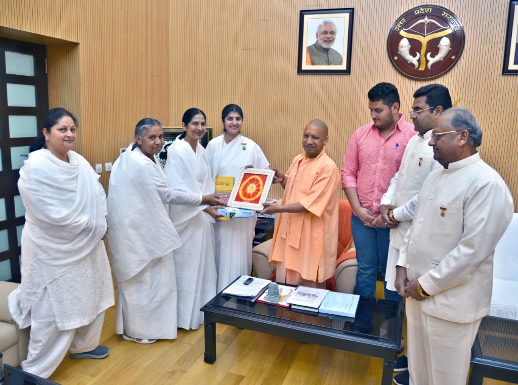 BK Shivani Bahen giving Godly Gifts to U.P. Chief Minister Yogi Adityanath ji